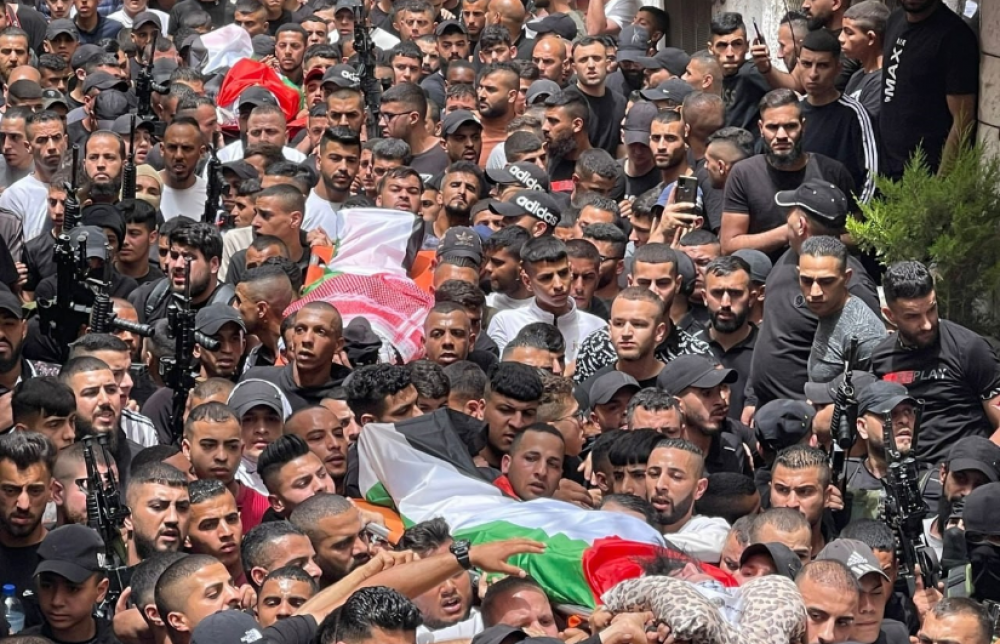 The three martyrs are mourned in Nablus in a hostile climate.